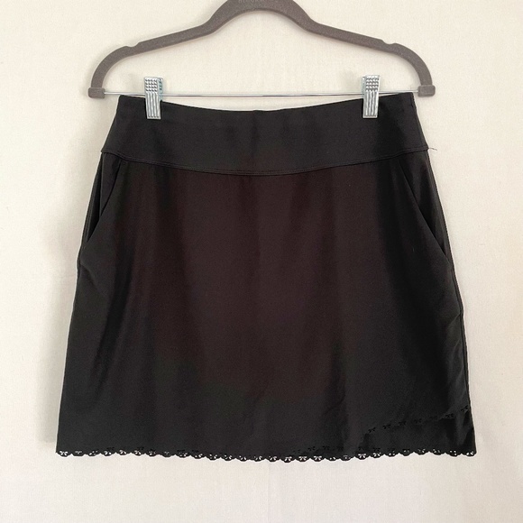 GREG NORMAN Women's Small Golf Skort Black Pull On Laser Cut Bow Tie Hem Pockets - Picture 1 of 7